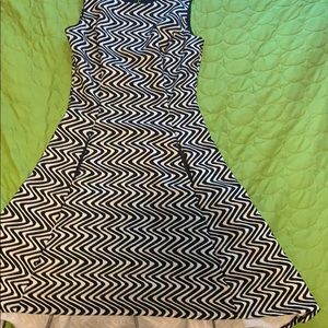 Black and white fit and flare dress.